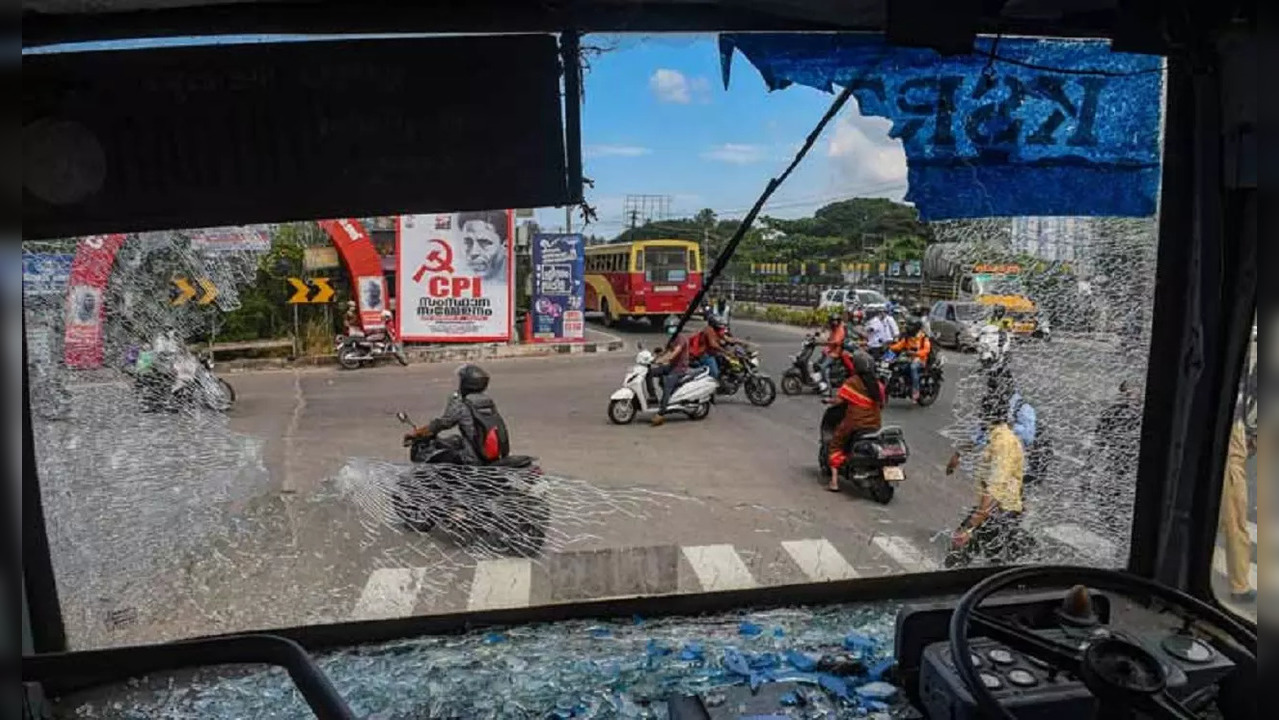 Broken windshield of a Kerala State Road Transport Corporation bus after some miscreants threw stones on it during a hartal called by the Popular Front of India