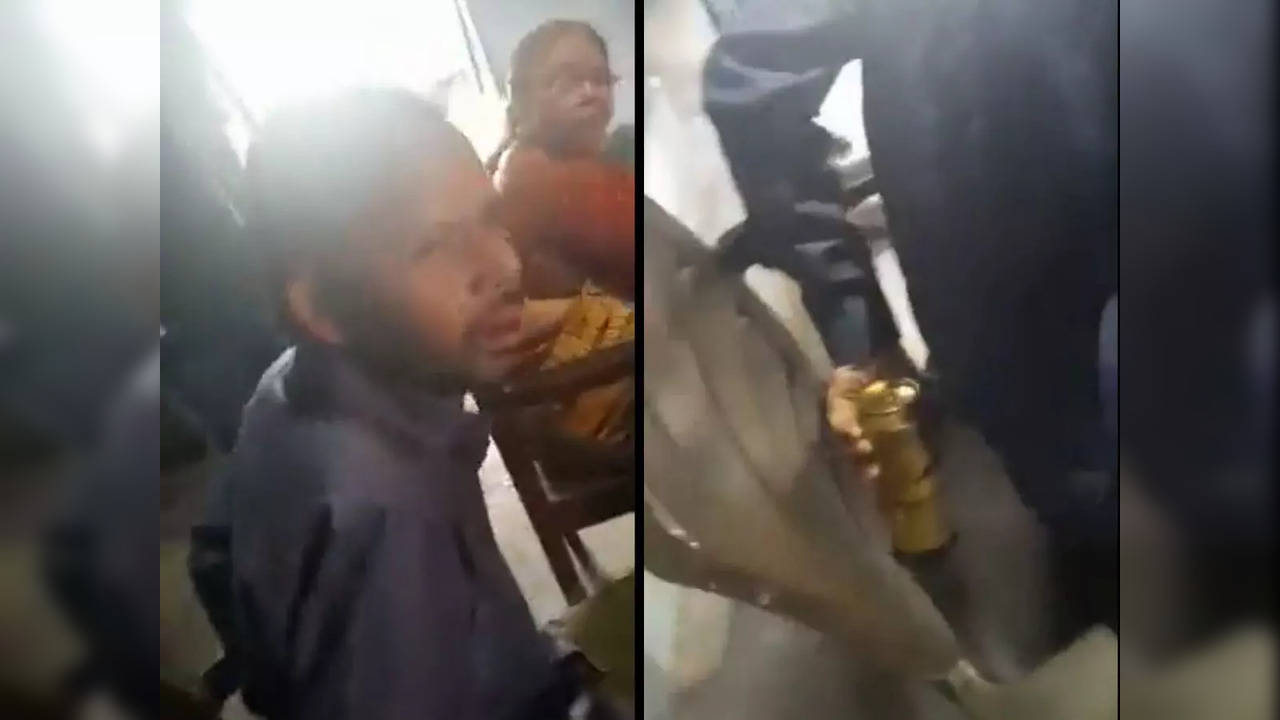 Shailendra Singh Gautam, an assitant teacher at Hathras-based DRB Inter College, caught drinking in the presence of students | Screengrab