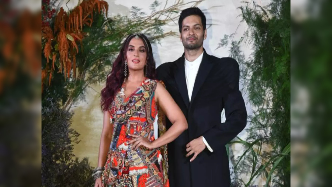 Ali Fazal, Richa Chadha opt for quirky outfits as they pose for paps at wedding reception in Mumbai - PICS