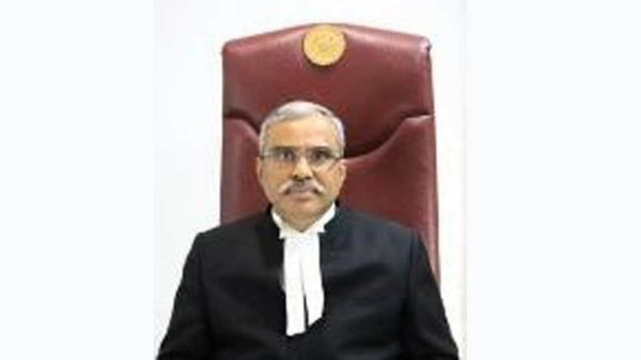 Justice Dinesh Kumar Sharma