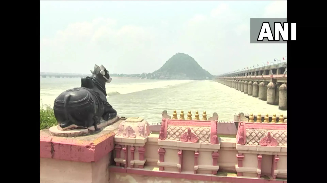 The first flood warning  issued at Prakasam Barrage after flood flow in Krishna river touched 4.07 lakh cusecs