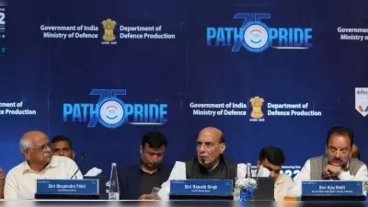 Ahmadabad :Union Defence Minister Rajnath Singh with Gujarat Chief Minister Bhupendra Patel and Minister of State for Defence Ajay Bhatt during curtain raiser for defence expo 2022 in Gandhinagar on Monday, Oct. 17, 2022.(PHOTO:IANS/Siddharaj Solanki)