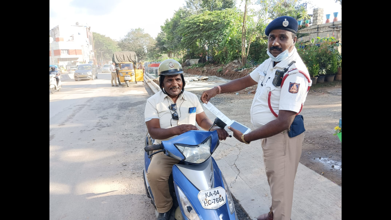 Bengaluru traffic policeman fines another cop for wearing wrong helmet