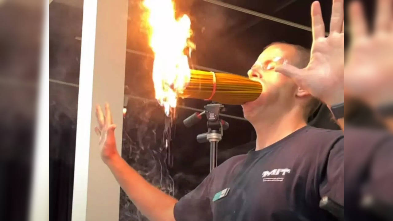 Man holds 150 lit candles in mouth to break Guinness World Record | Screenshot from video by David Rush