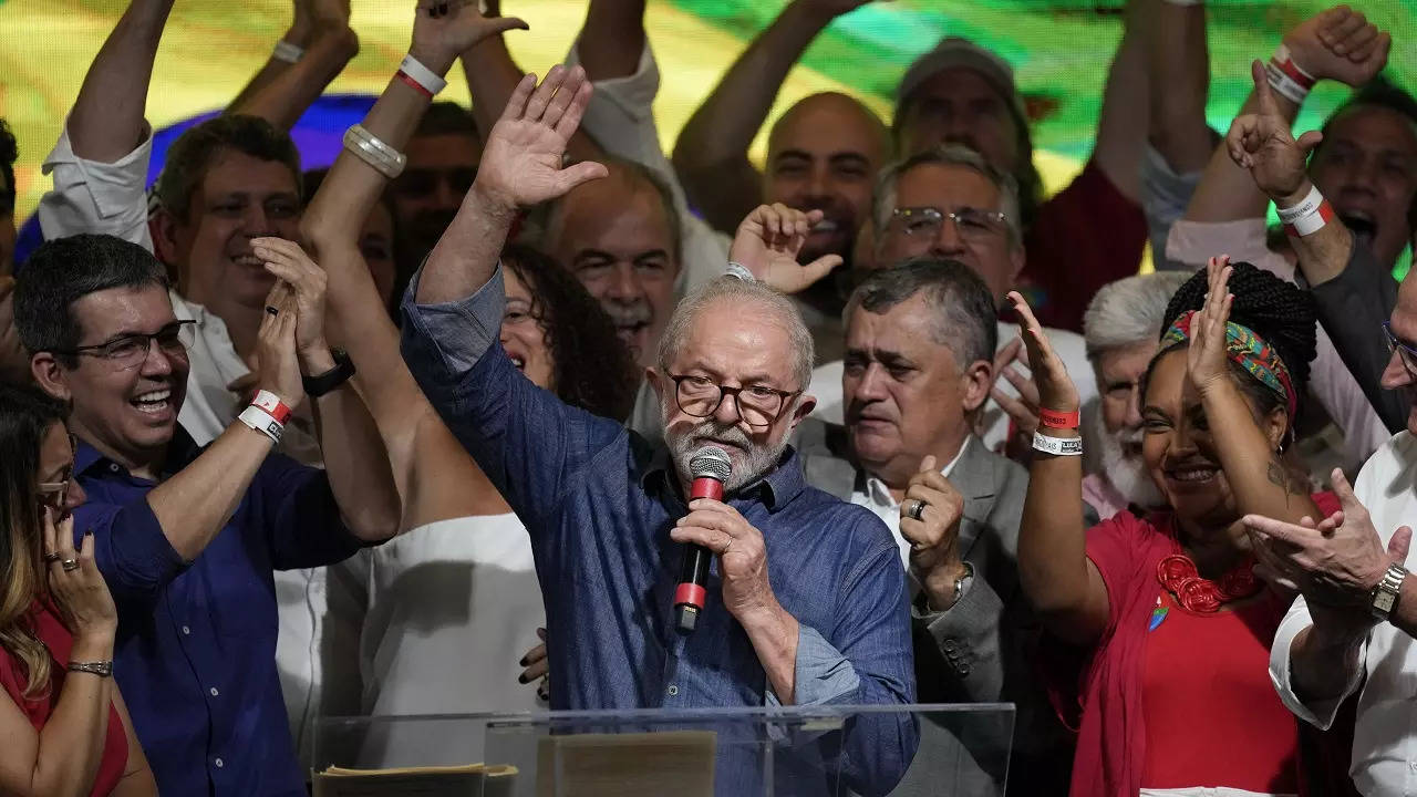 Former Brazilian President Luiz Inacio Lula da Silva celebrates defeating incumbent Jair Bolsonaro in a presidential run-off election