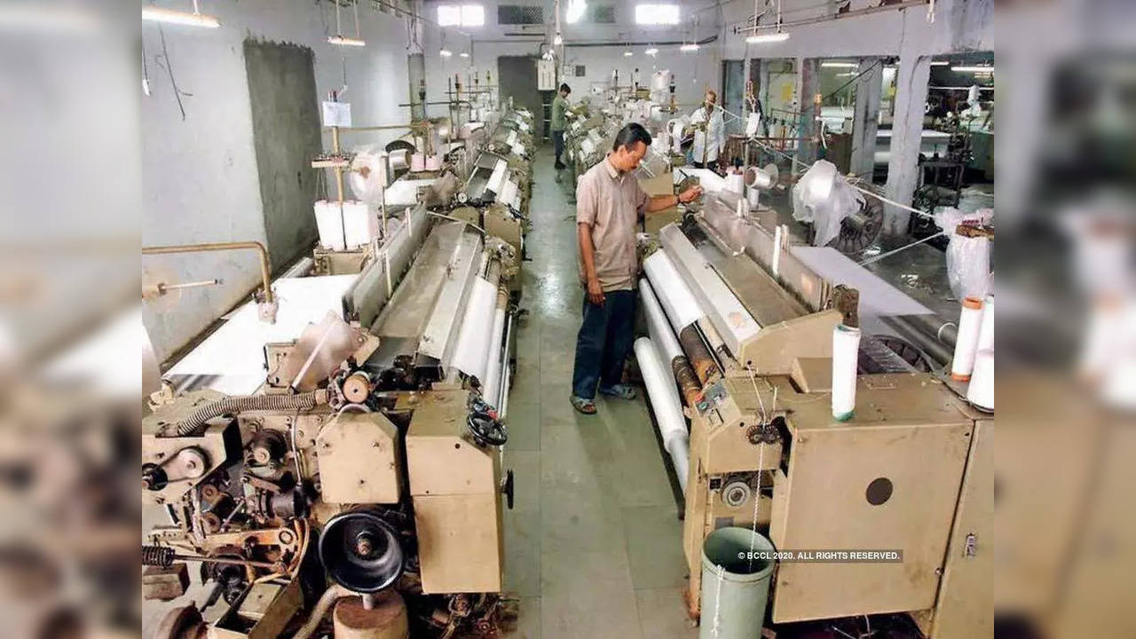 India's factory growth picks up speed in October, hiring at 33-month high.