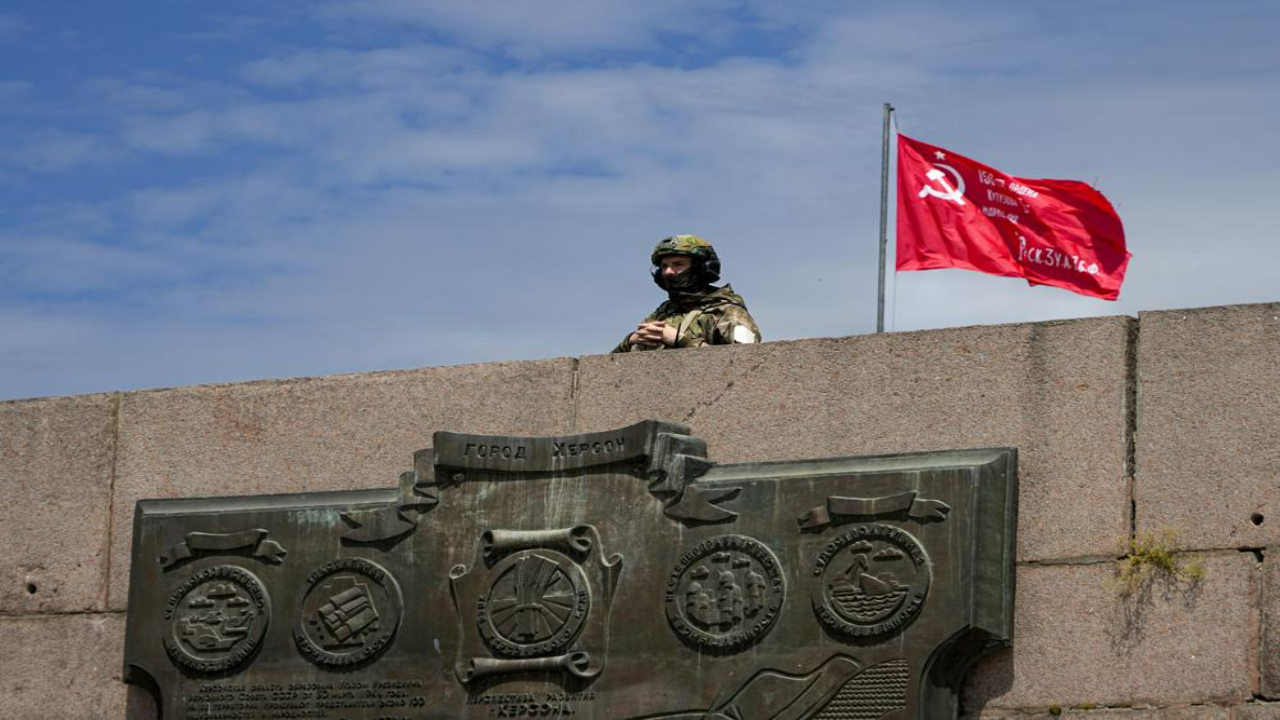 File Photo: A Russian soldier guards an area at the Alley of Glory exploits of the heroes