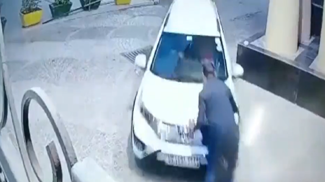 Caught-on-cam: Man hits security guard with car while trying to evade ...