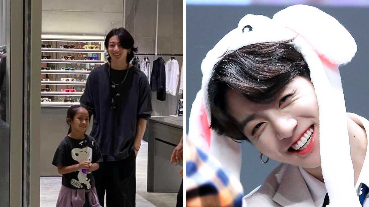 BTS' Jungkook poses with a young girl