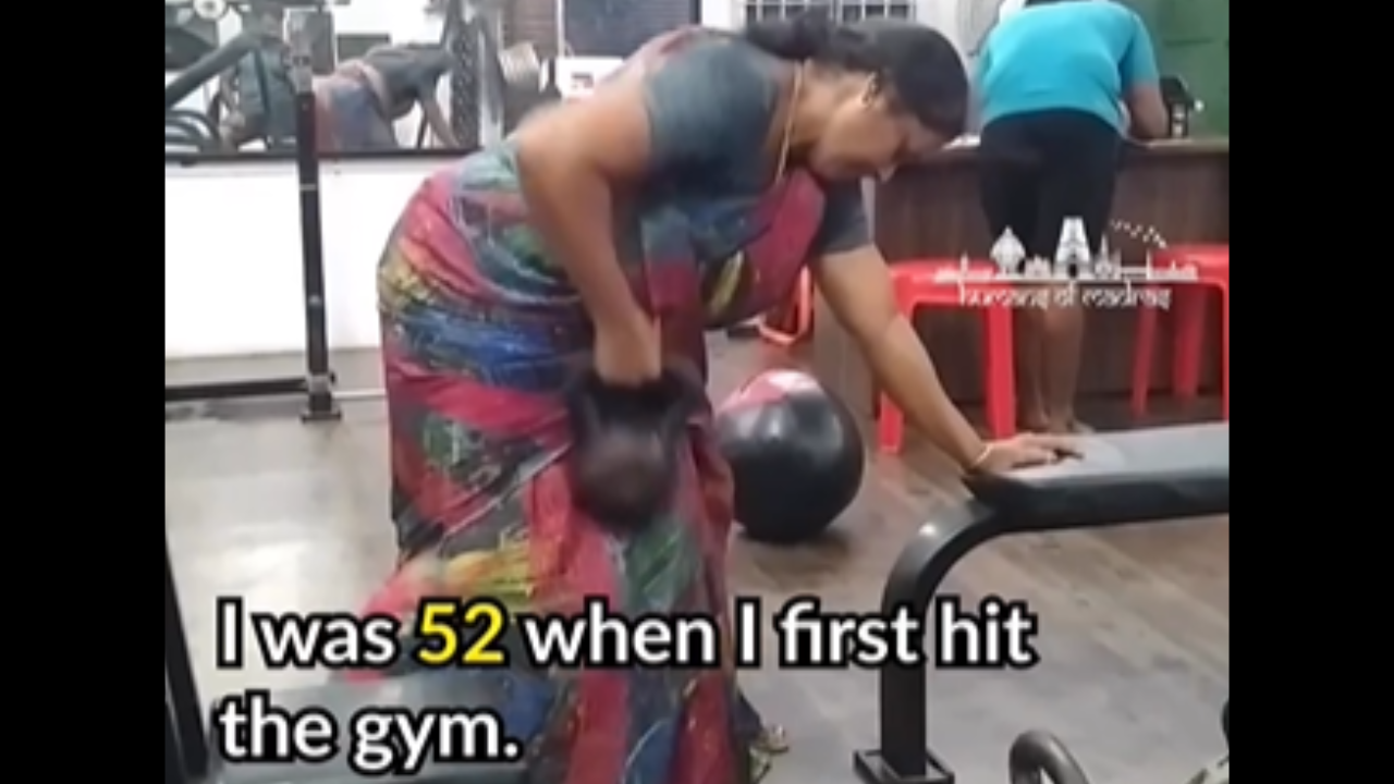 56-year-old woman in saree works out at gym with her bahu