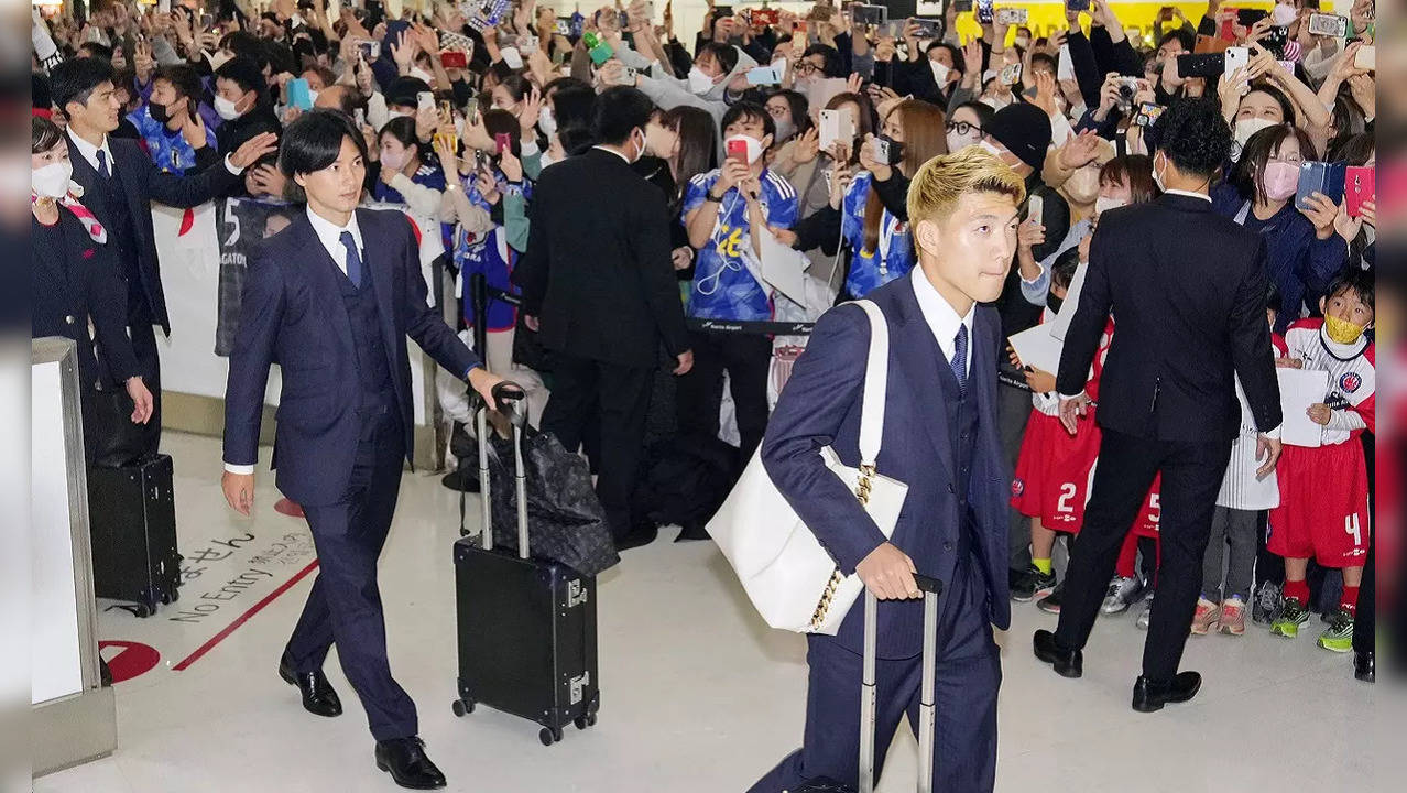 Japan players heroic welcome.