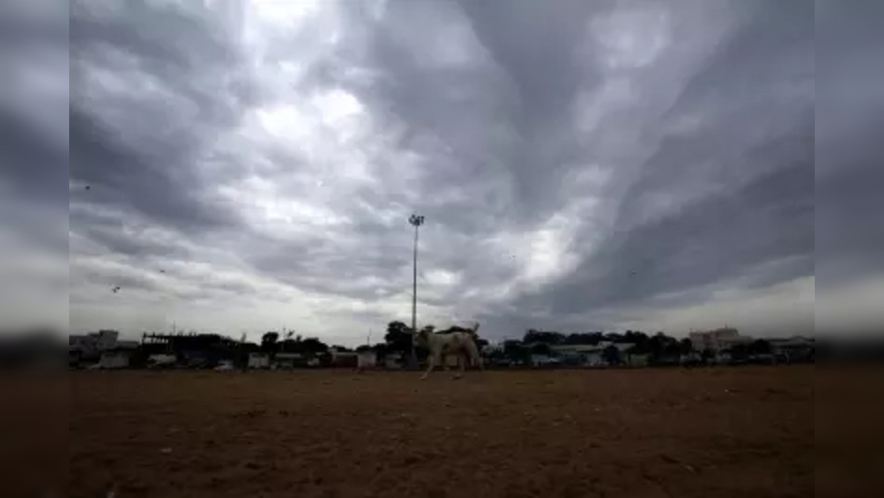 Dark cloud hover over the Marina Beach