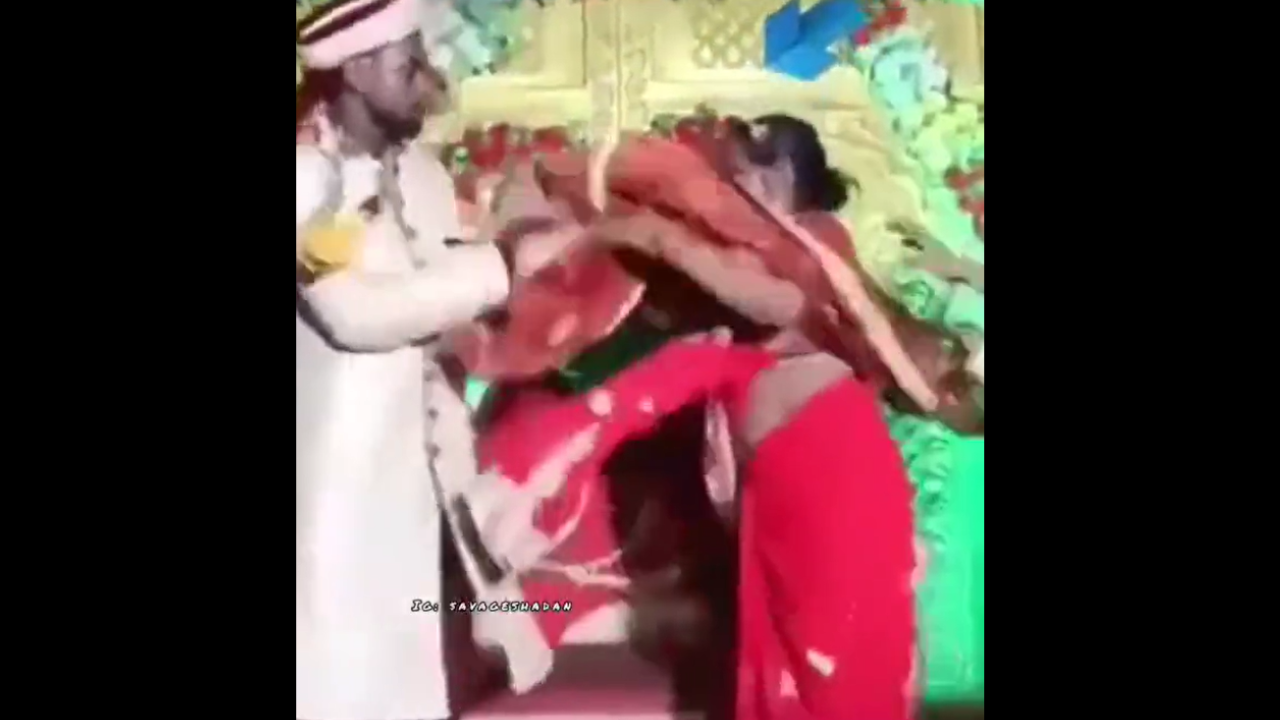 Bride slaps groom after he forces her to eat mithai, 'kalesh' captured in viral video