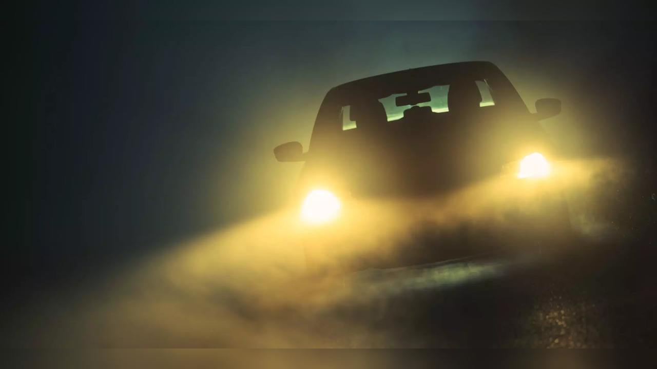 A car driving in fog