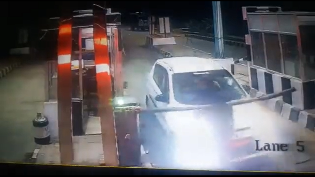 The video footage showed the plaza staff trying to stop the car when it was running past the barrier.