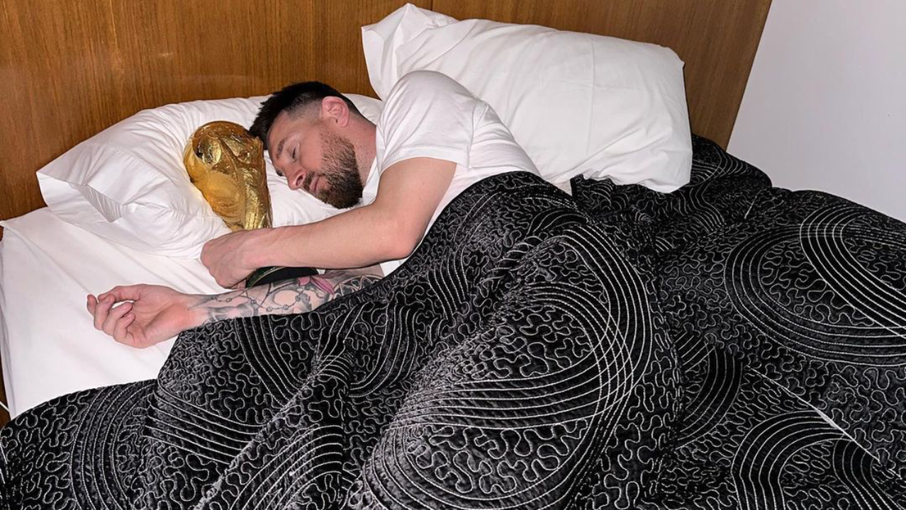 Lionel Messi trophy sleeping Instagram