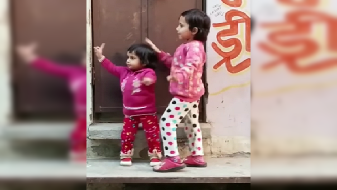 Little girls dance to dhol beats