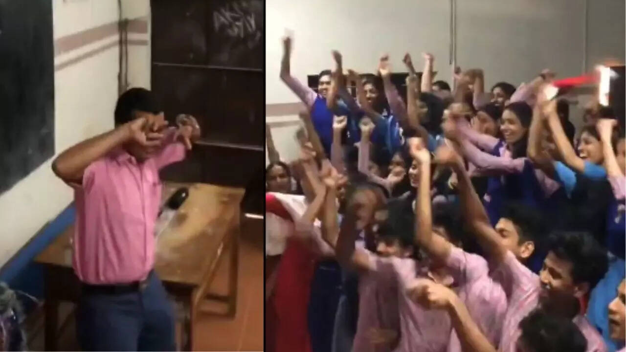 Teacher dancing with students