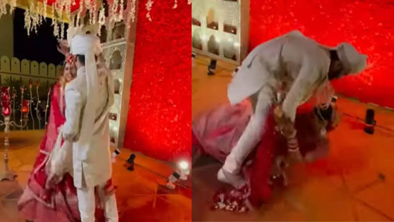 Bride and groom falls down