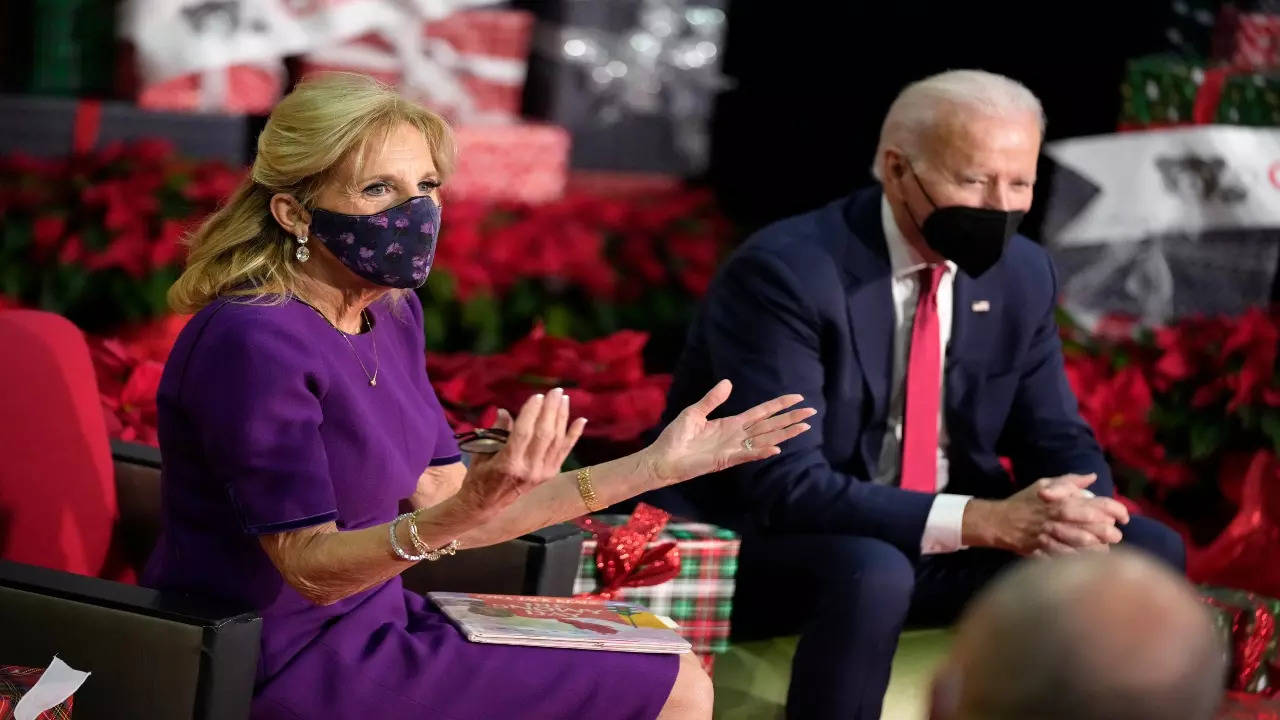 First lady Jill Biden, accompanied by President Joe Biden, speaks after she read _The Snowy Day_ by