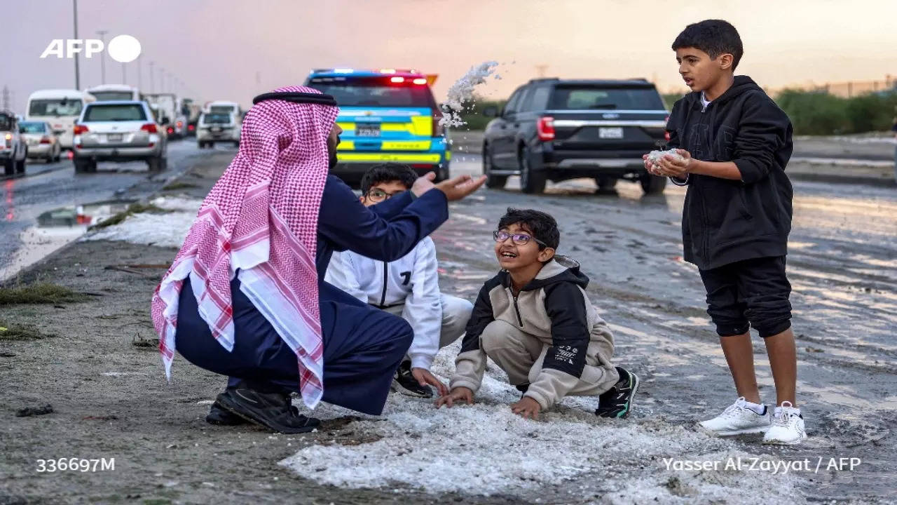 Visuals of locals enjoying the hailstorm