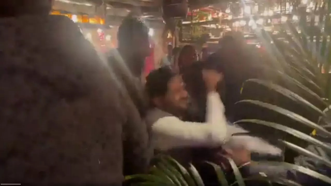 A viral video shows a group of drunk men seemingly fighting at the Sutra pub in Noida's Garden Galleria mall | Screengrab: Twitter