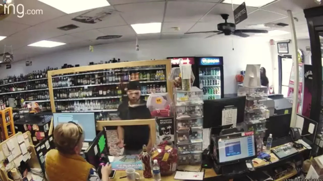 A Florida man who stole a Tequila bottle by sliding it down his pants is being forgiven by the store's owner | Screengrab: Ring.com