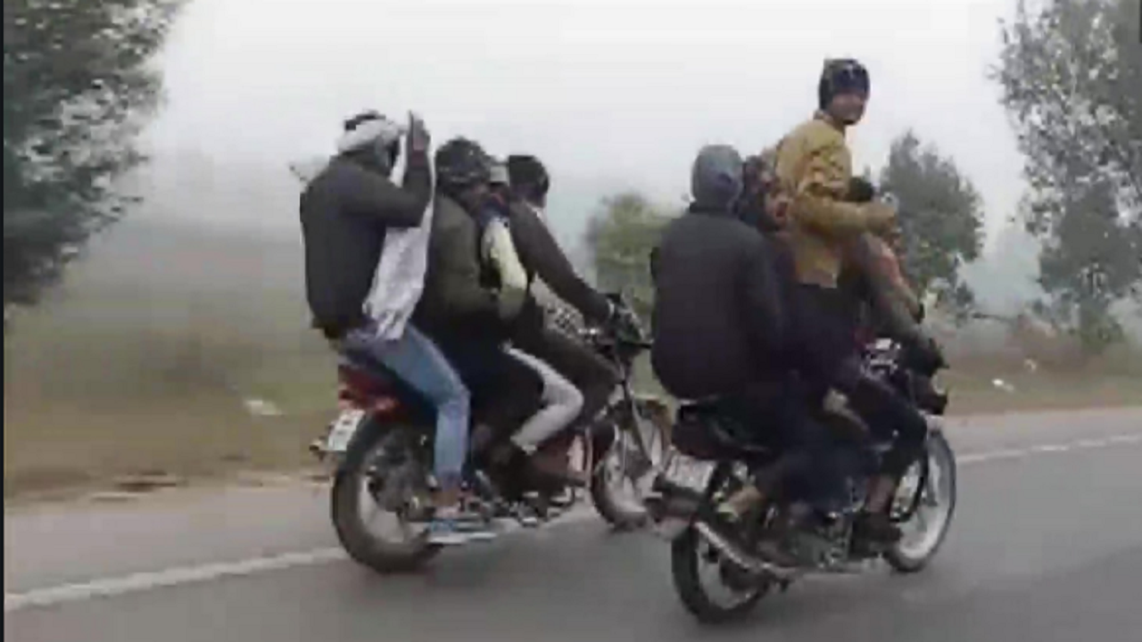 14 men perform dangerous stunt on 3 bikes