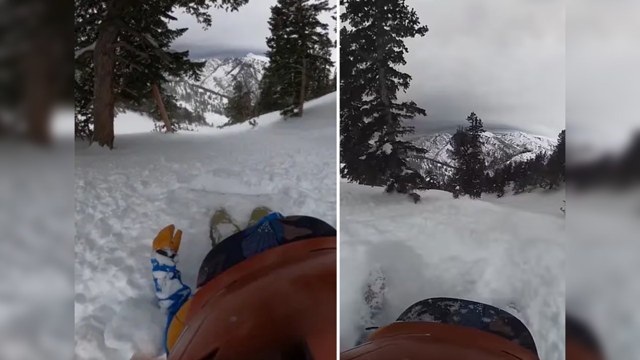 Viral video: Man on snowboard slides down mountain while trapped