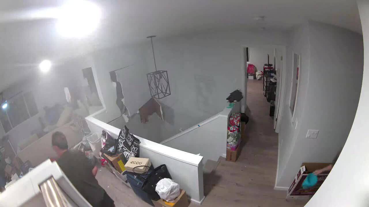 Family shocked after massive boulder crashes through their new home's