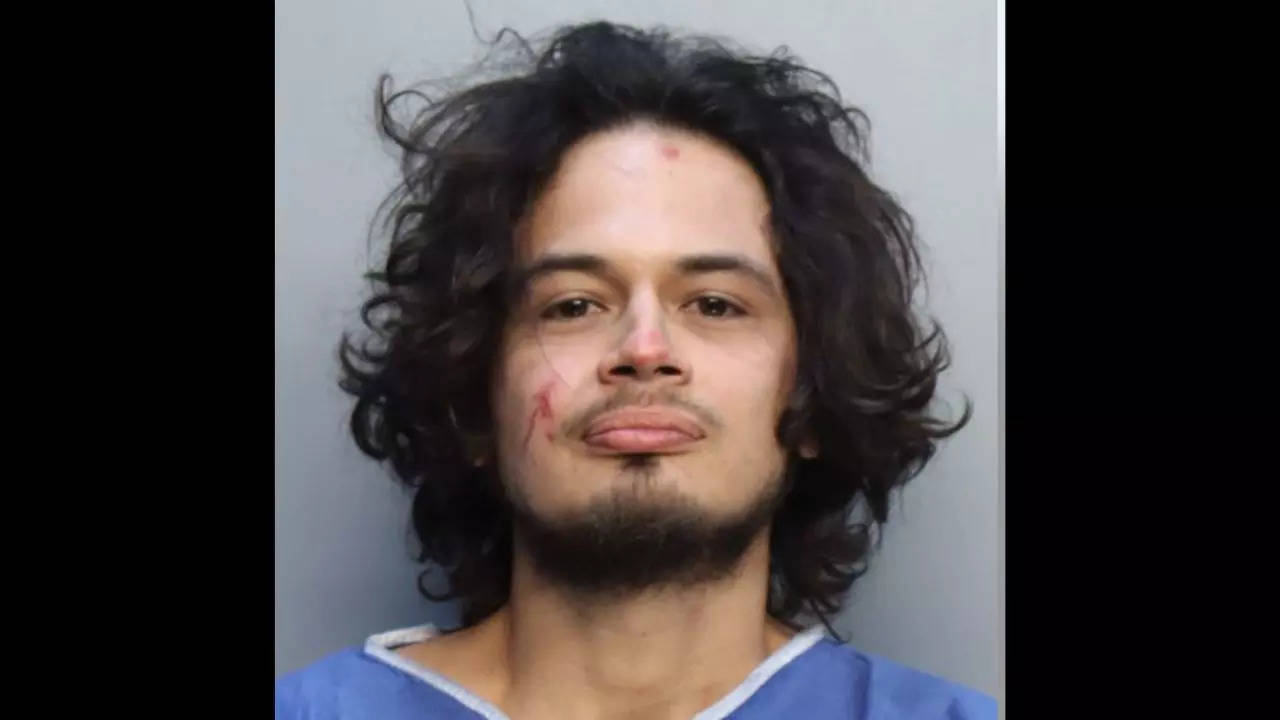 A Florida man, identified as Kevin Mayorga, was arrested after he allegedly bit off the head of his wife's pet ball python snake during a fight on Monday | Courtesy: Miami Dade Corrections