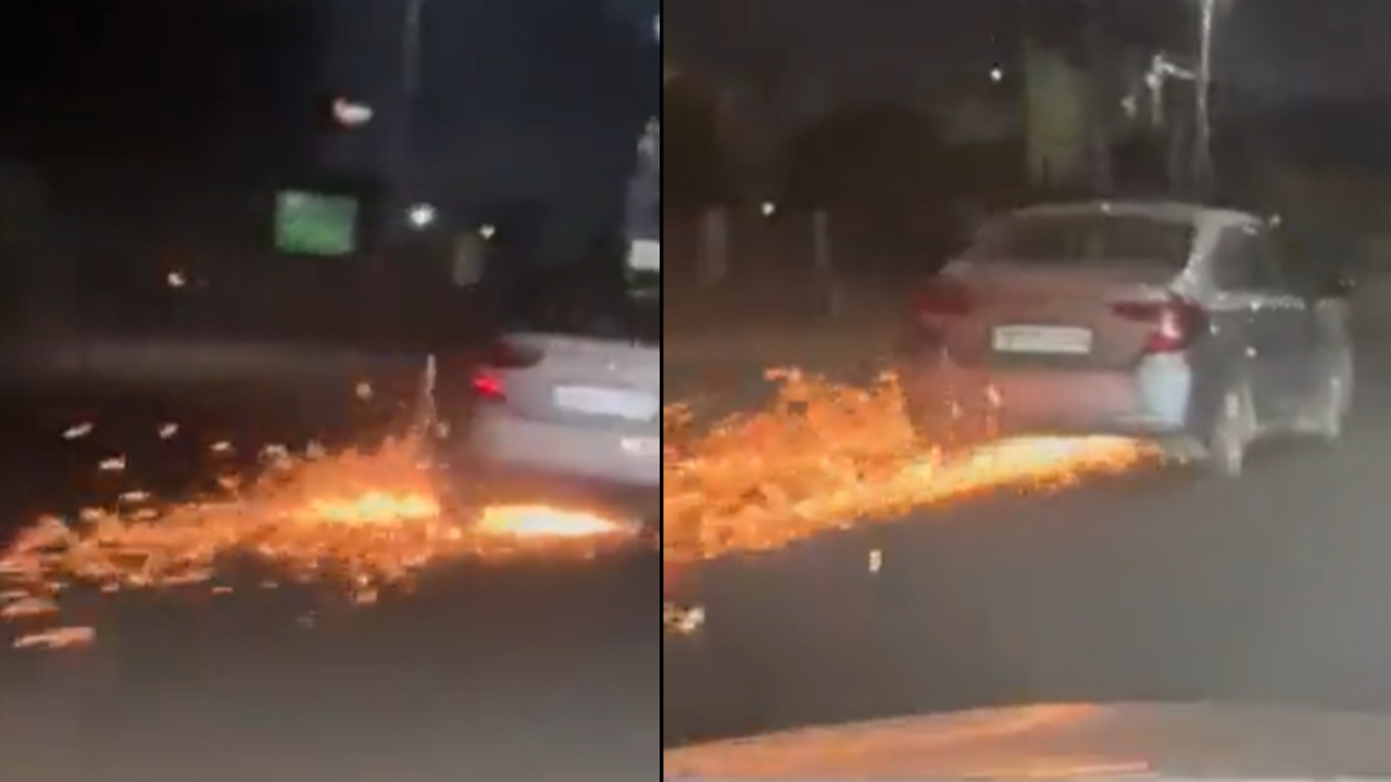 Car drags bike for 3 kms produces F1-like sparks, video goes viral Source: Twitter