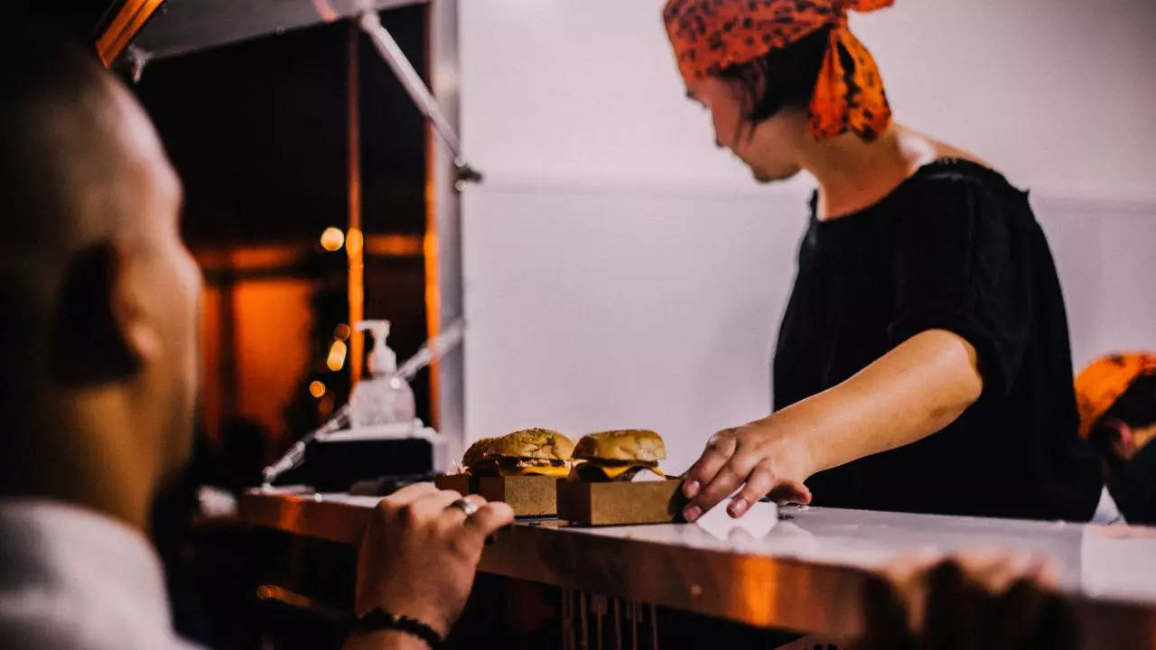 A man in the UK accidentally paid Rs 66,000 for a burger after a night out with friends | (Representative image: Pexels)