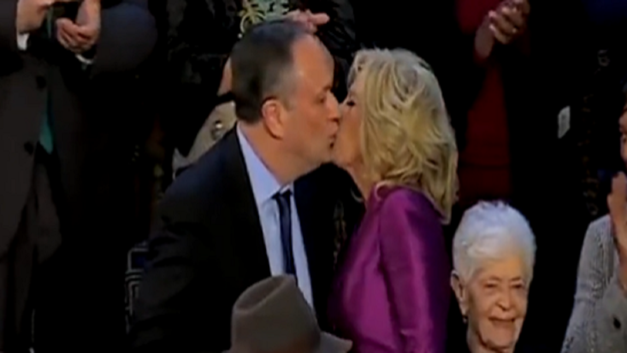 Jill Biden kisses Kamala Harris' husband on the lips