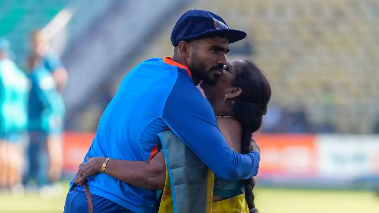 KS Bharat hugs his mother.