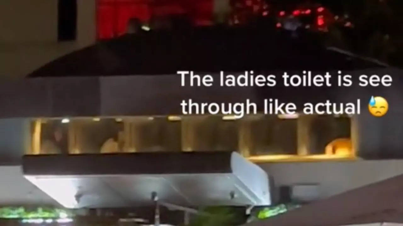 A 'see-through' ladies toilet at the Headquarters bar in central Auckland, New Zealand, sparked social media outrage after a viral video showed multiple women seen using the loo through now-covered-up windows | Screenshot: @celp333/TikTok