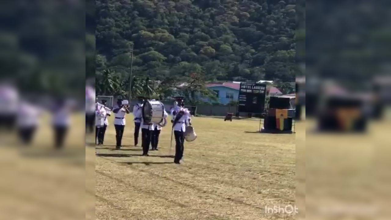 Marching band's drum major breaks into dance to entertain audience