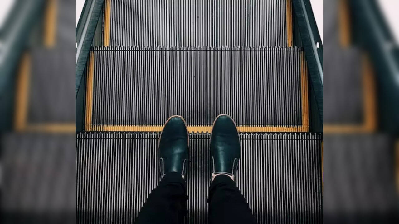 The brushes on the sides of escalators are not for cleaning shoes, they
