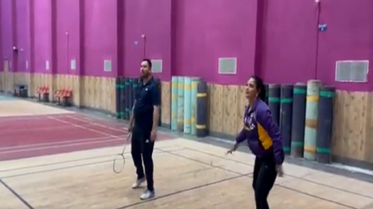 Tejashwi Yadav plays badminton with actor Nitu Chandra