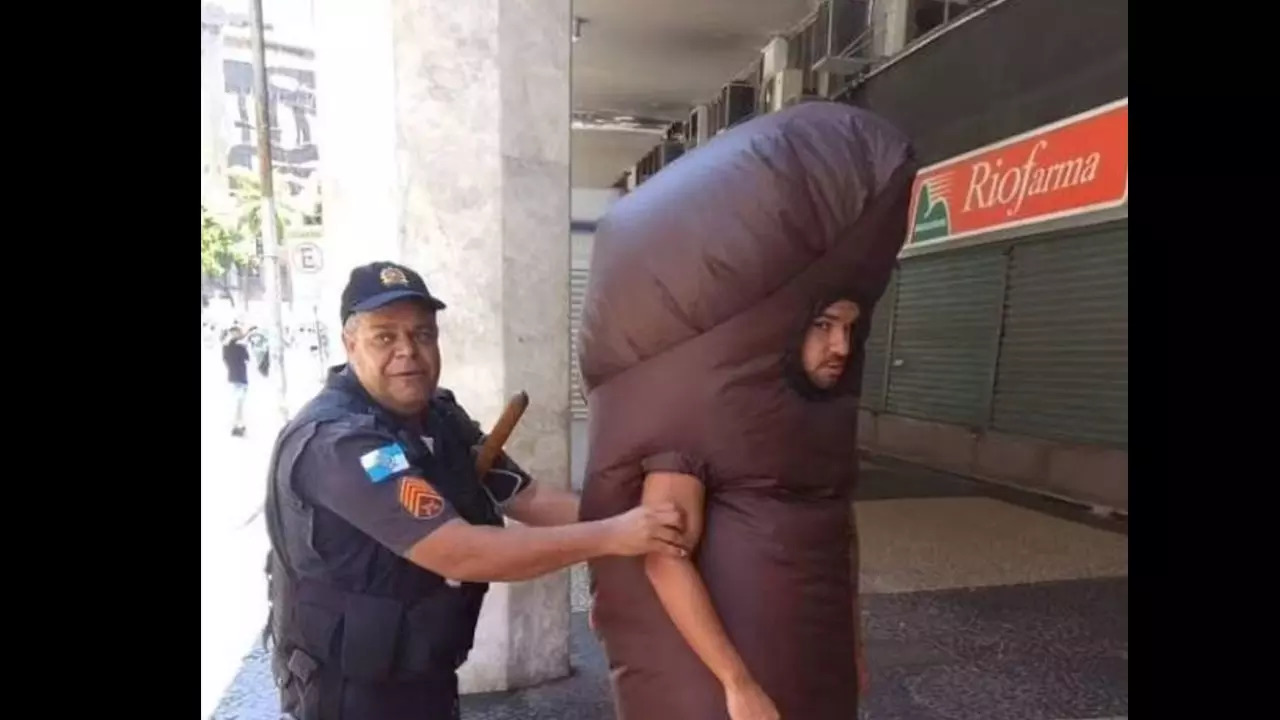 Military Police in Rio de Janeiro arrested the man dressed as the giant phallus in the city centre on Sunday for 'acting suspiciously'