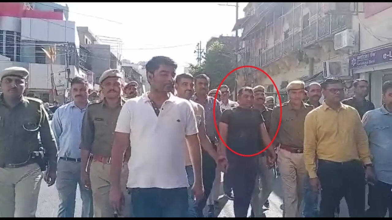 Rajasthan paper leak case Udaipur police parade accused Bhupendra Saran on road, video goes