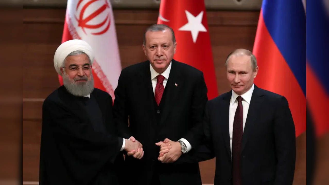 putin with turkey iran presidents.