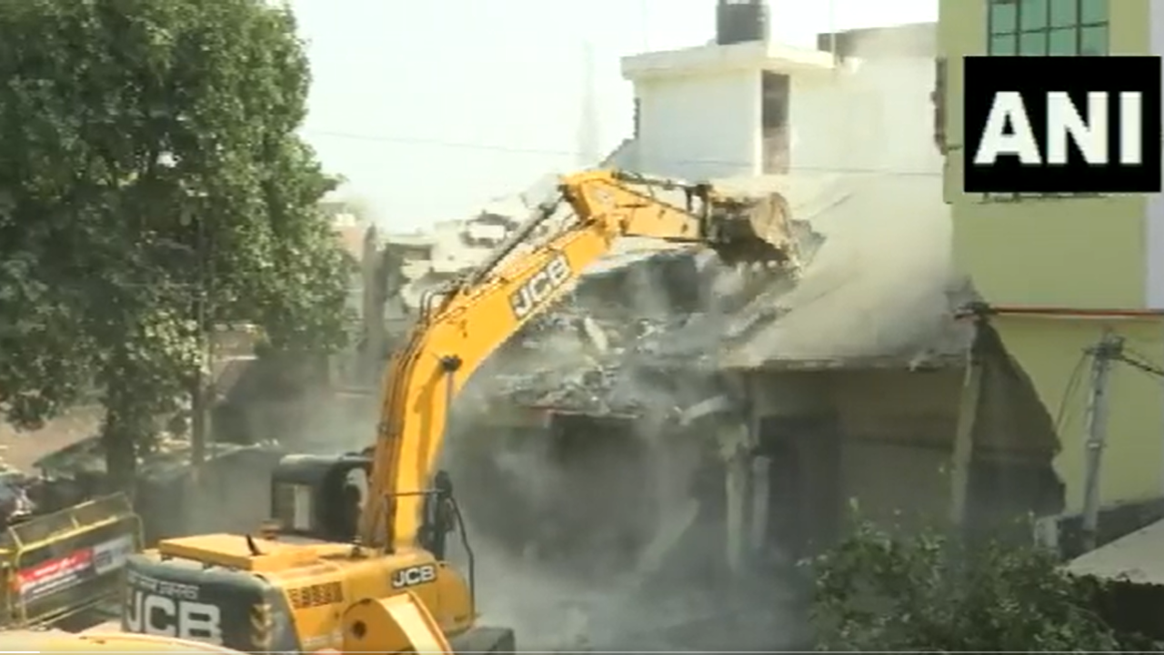 bulldozer action Atiq ahmed aide