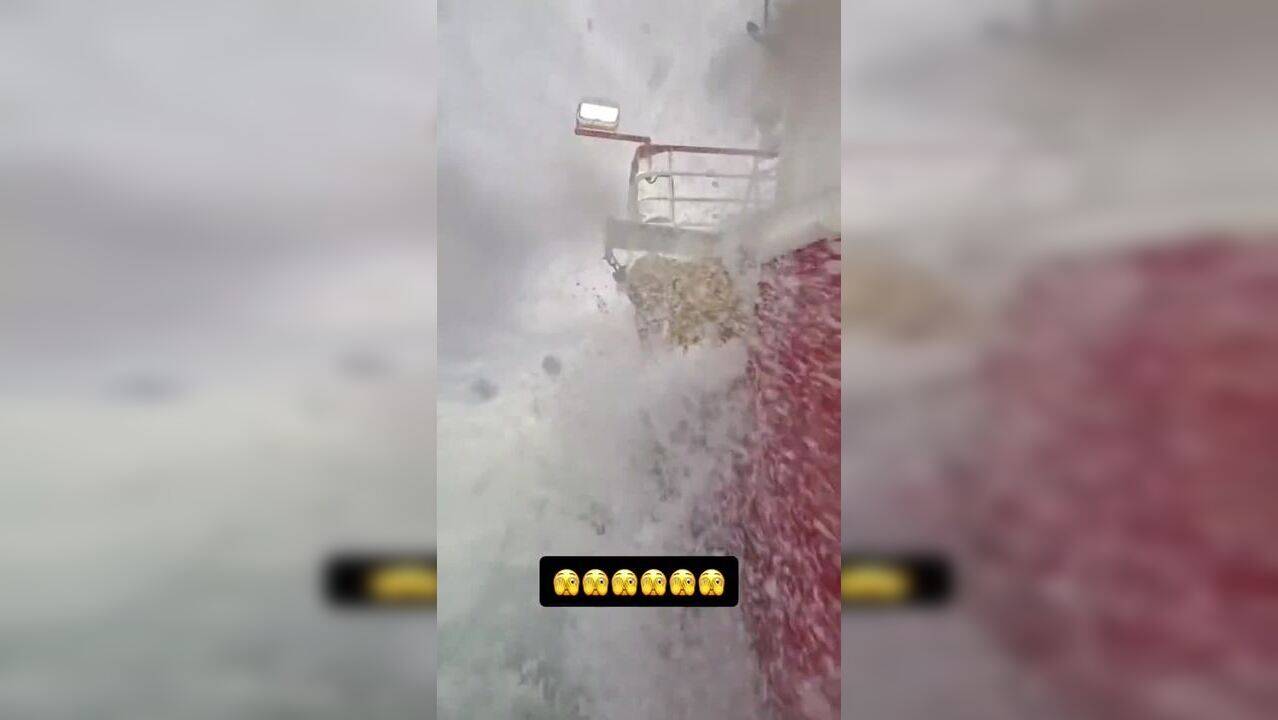 Brave sailor stands on ship deck amid turbulent waves, clip makes ...