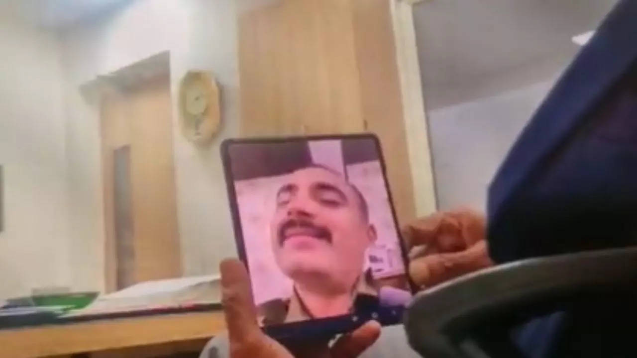 In the video, IPS officer Anirudh Singh is purportedly seen telling someone to arrange for Rs 20 lakh over a video call.​