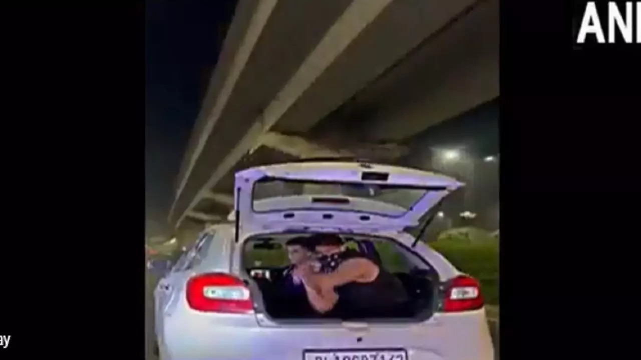 Gurugram Viral Video: Man Showers Cash From Running Baleno Car Watch ...