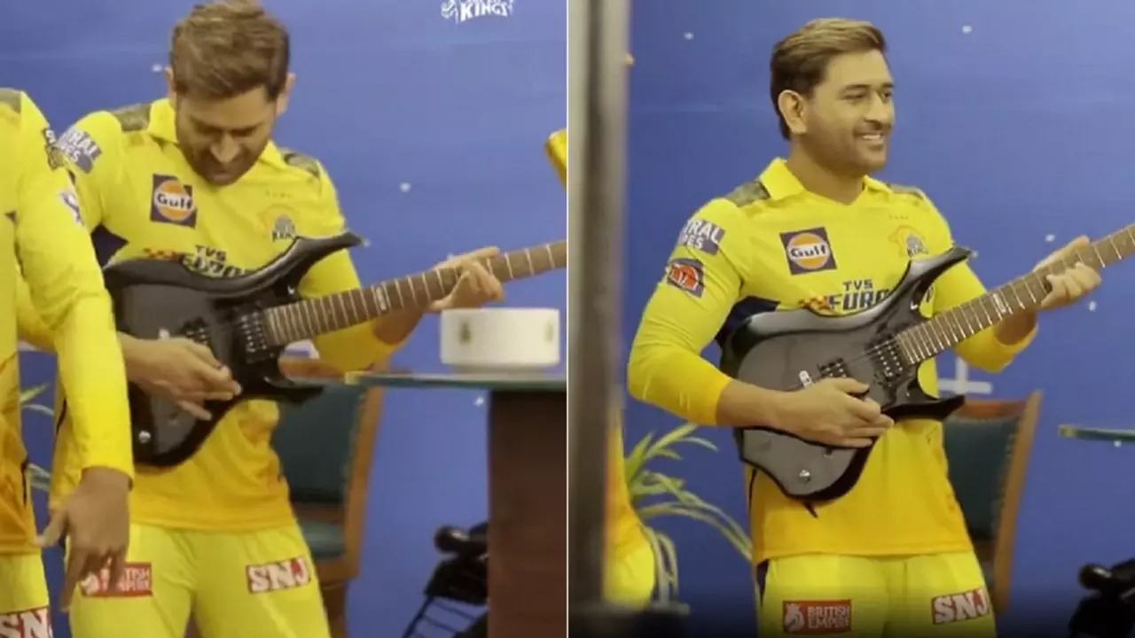 MS Dhoni playing guitar.