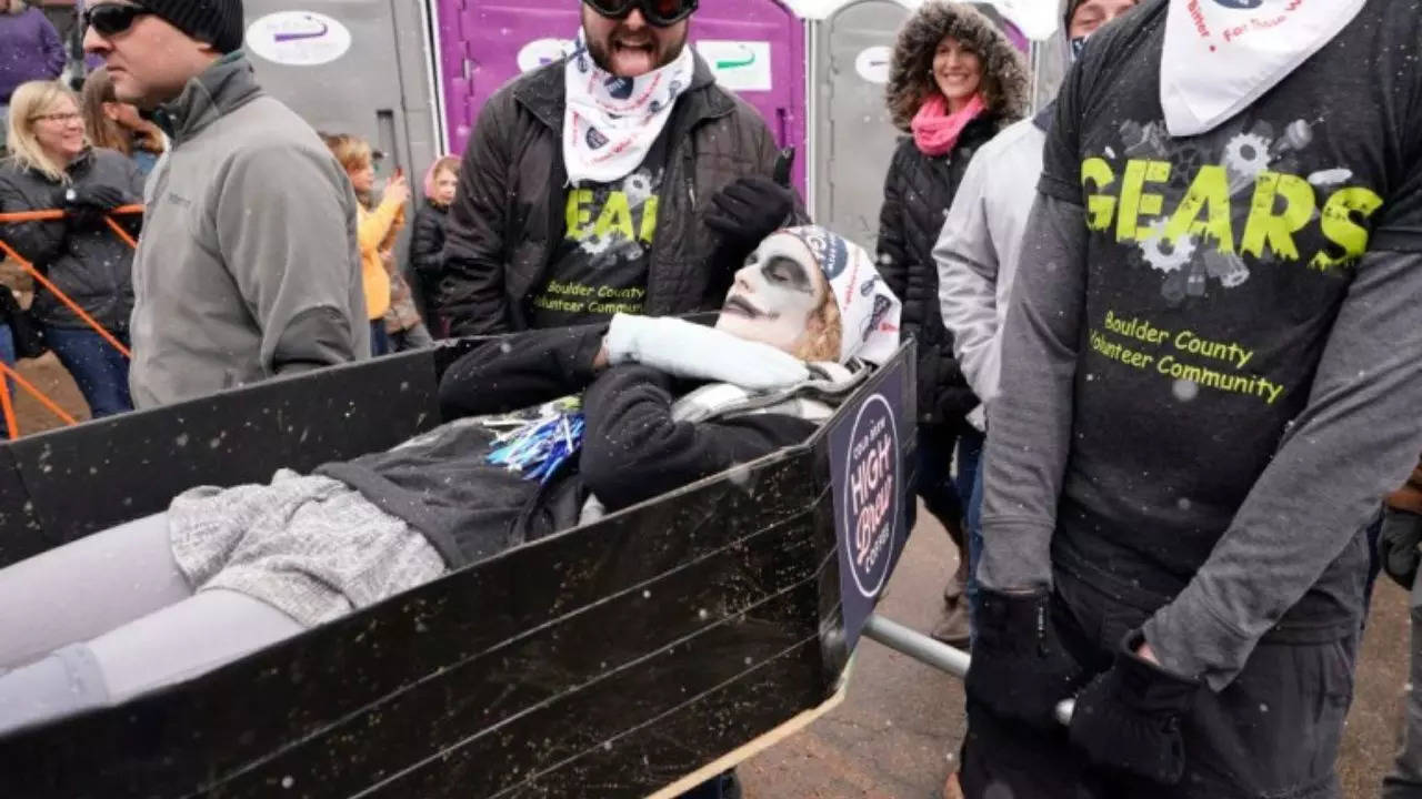 During the Coffin Race, one of the Frozen Dead Guy Days festival regulars, teams of six people dress up in costumes and race coffins down a hill | Courtesy: @metrouk/Twitter