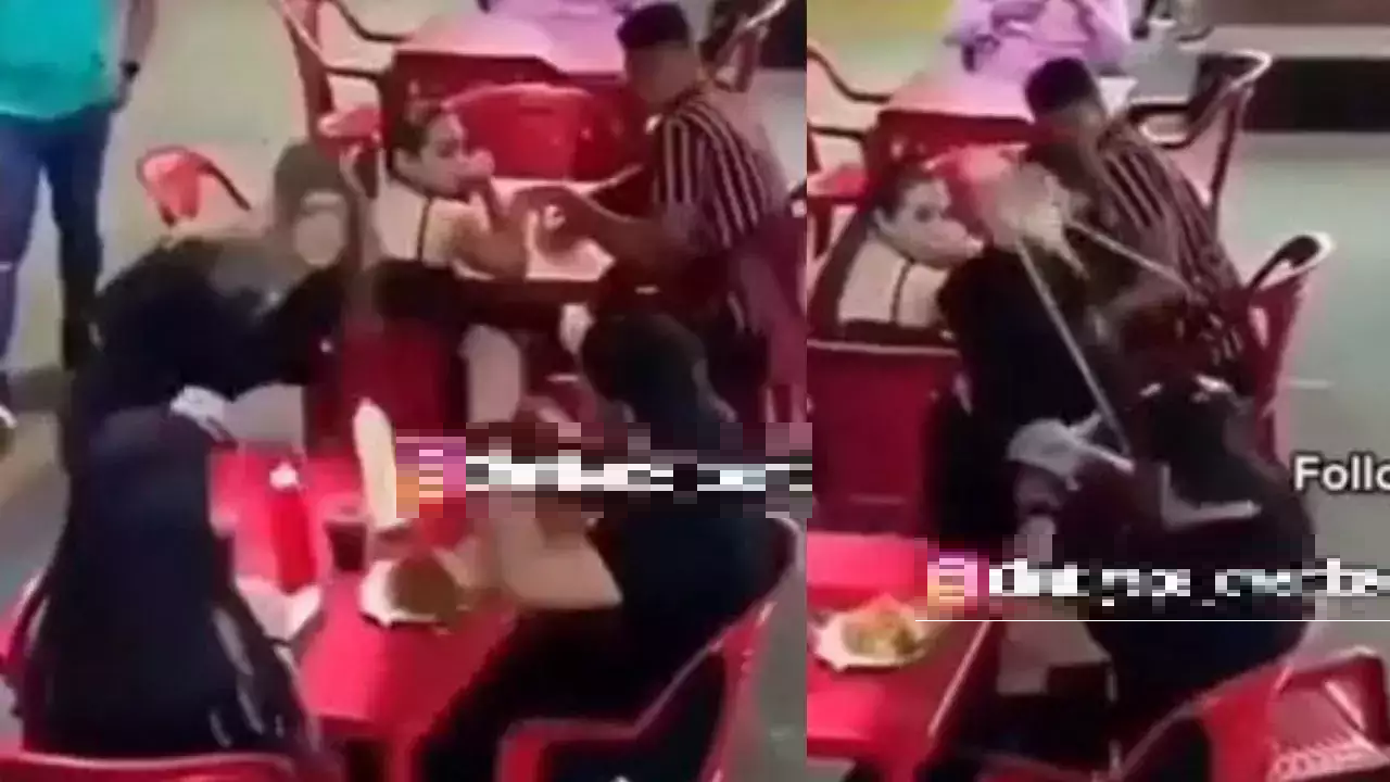 Viral video Angry girlfriend throws chair, mayonnaise at cheating