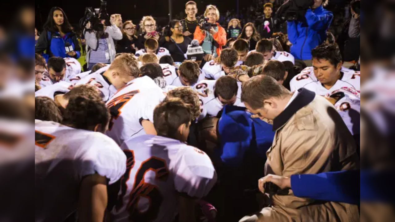 Joseph Kennedy with his players.